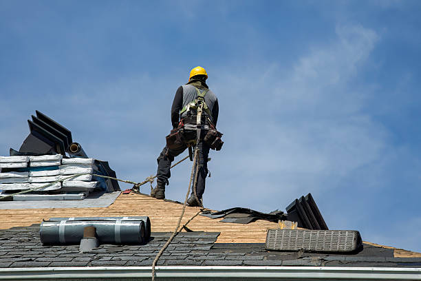 Professional Roofing technician working in Kansas City, KS